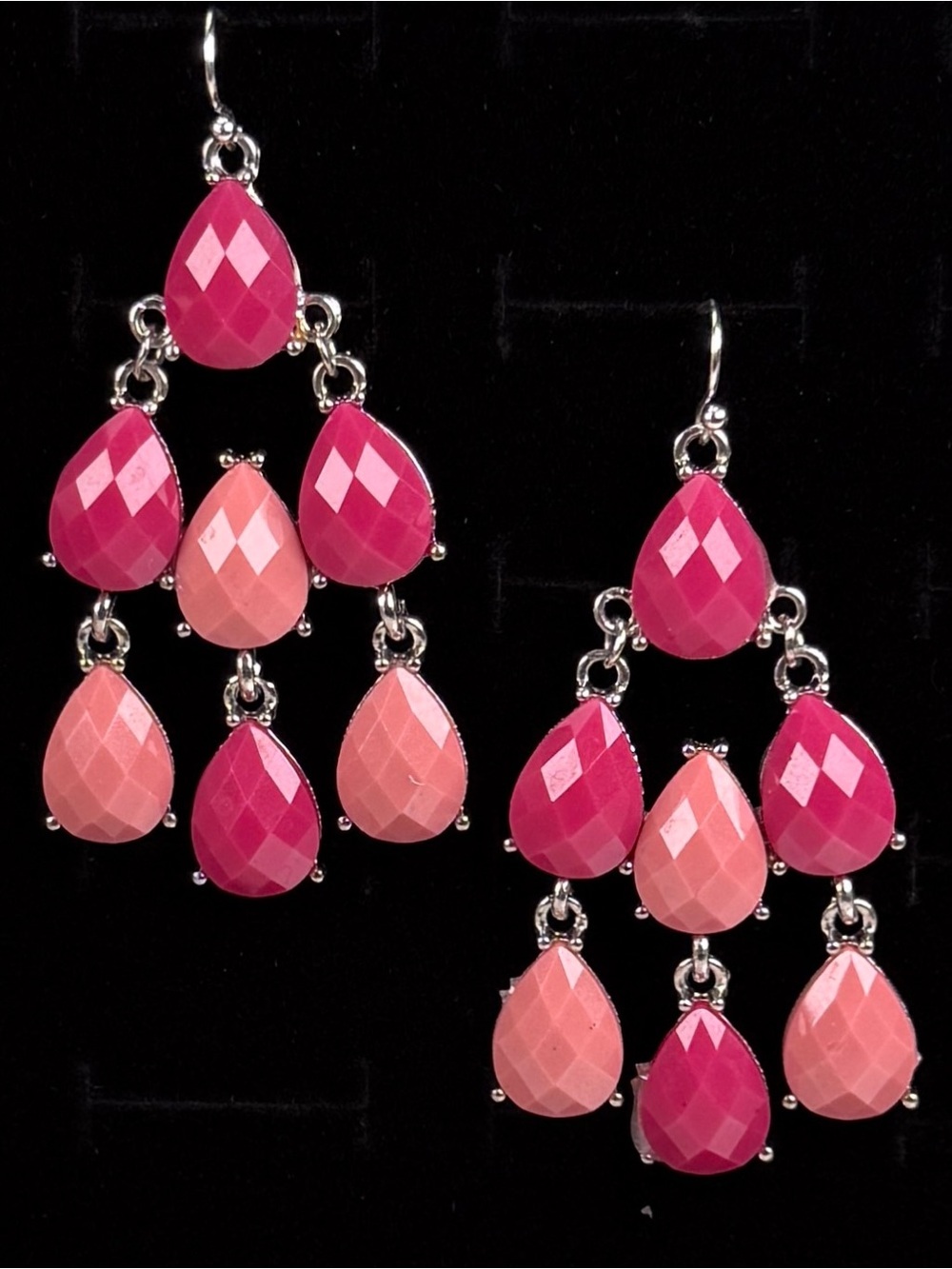 Silvertone and pinks hinged chandelier costume pierced earrings